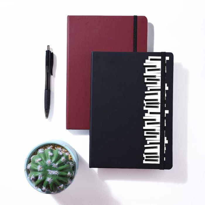 Grand Piano Black Notebook by Yashraj Mukhate
