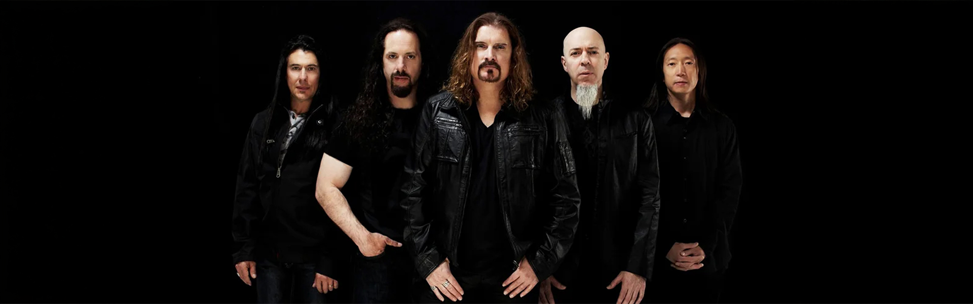 Dream Theater full band official press photo featuring James LaBrie, John Petrucci. John Myung, Jordan Rudess and Mike Portnoy for India tour 2026